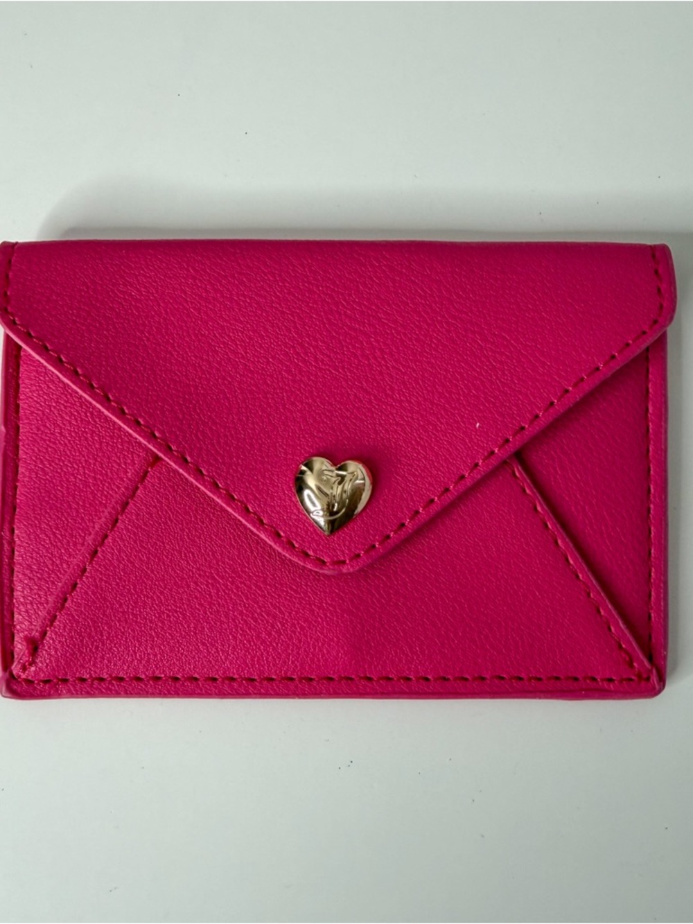 Juicy Couture Hot Pink Envelope Card Holder with Gold Heart Accent.
